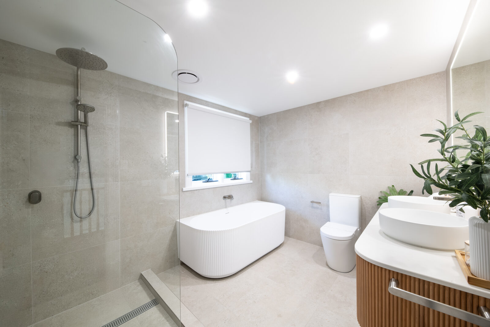 Main bathroom with freestanding bath and double vanity