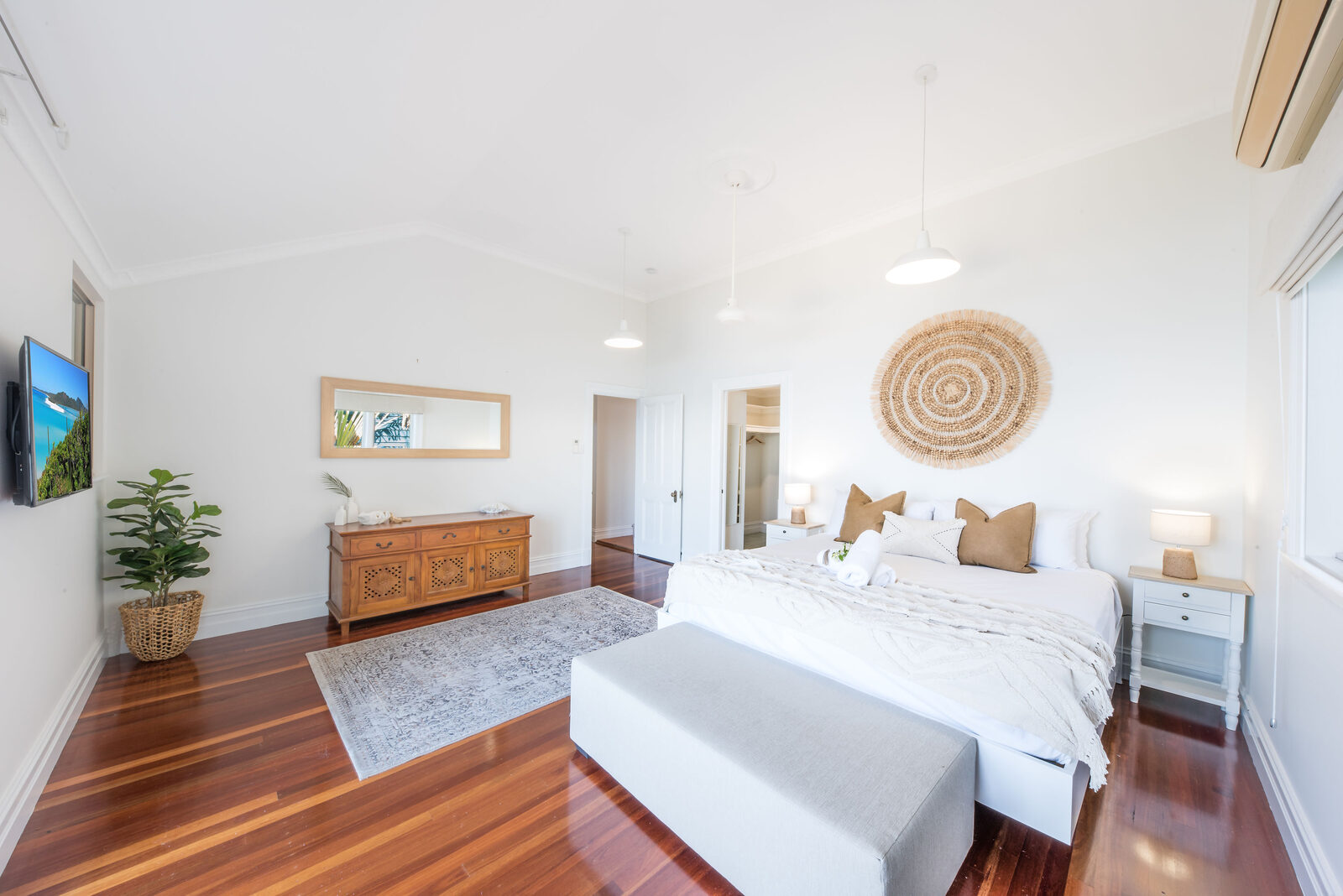 Master suite with king bed and Coral Sea views