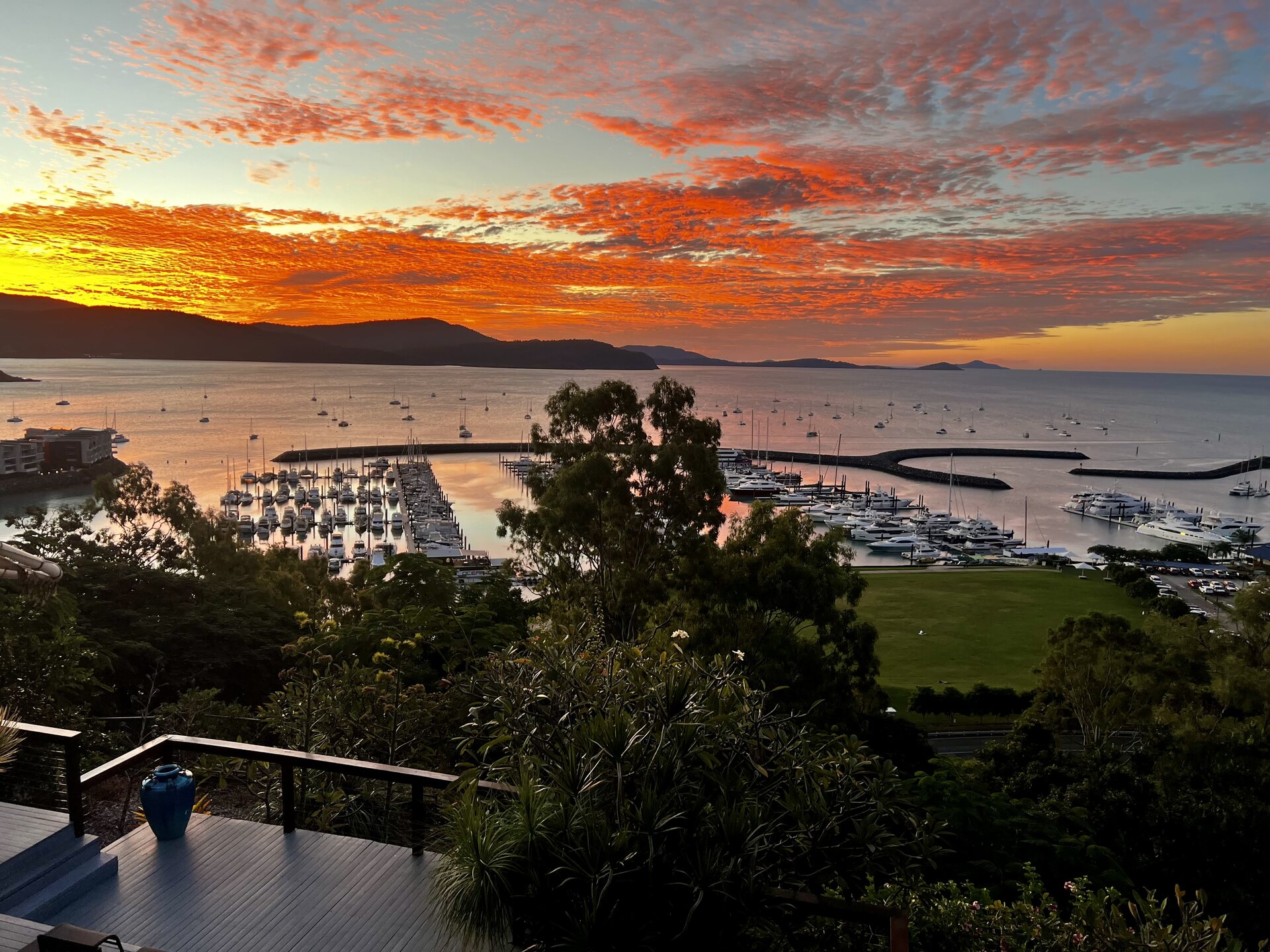 Fiery sunset over Coral Sea Marina from the deck