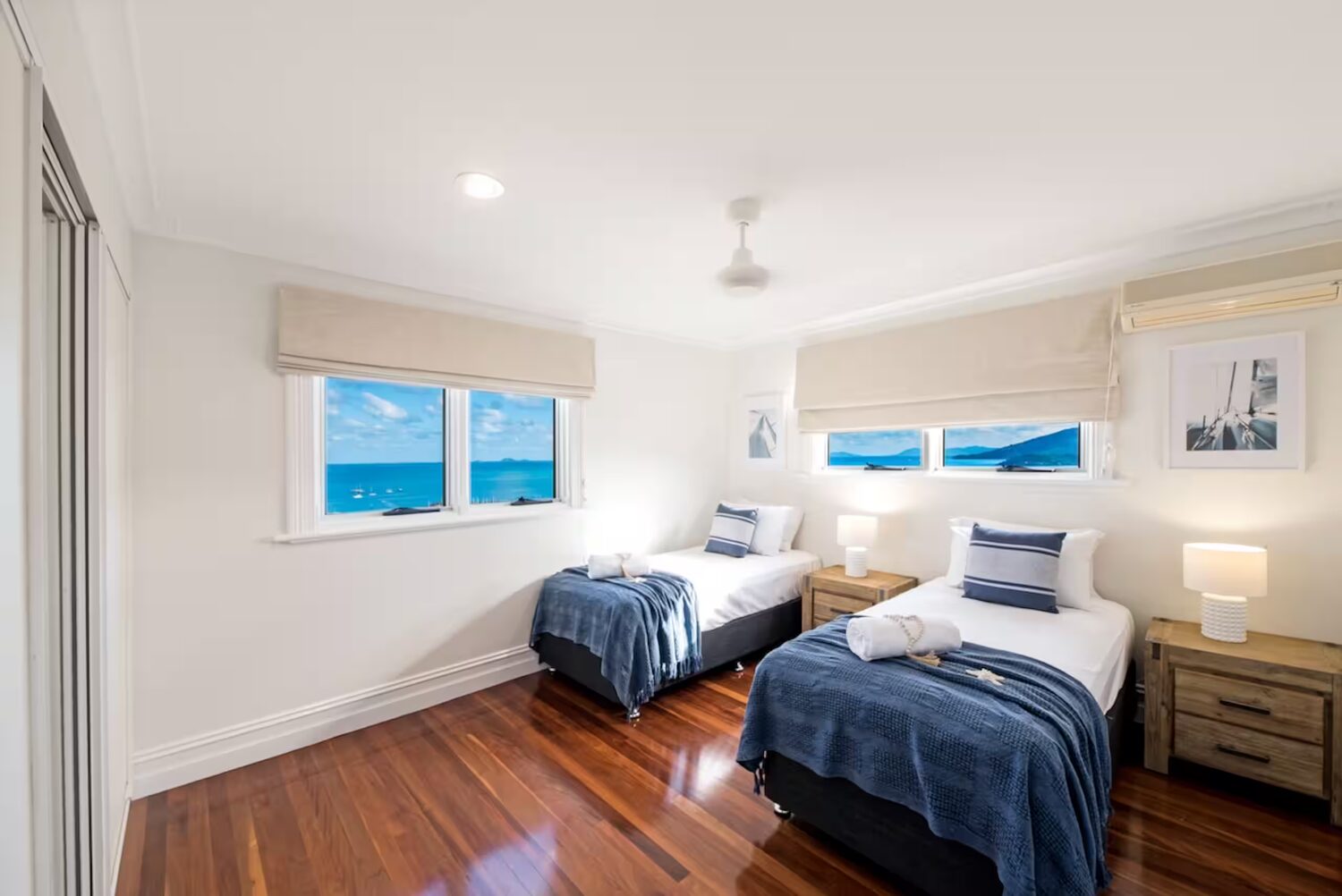 Twin room with two single beds and Coral Sea views